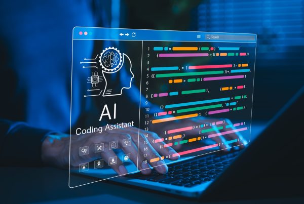 AI Coding Assistant on Screen with person typing on a keyboard.